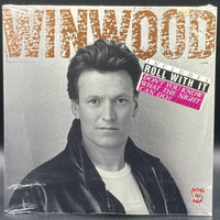 Steve Winwood - Roll With It